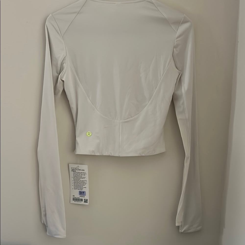 lululemon athletica White Long Sleeve Women's Top cropped